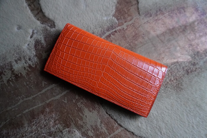 100万収納オレンジ色ナイルクロコダイル二つ折り長財布